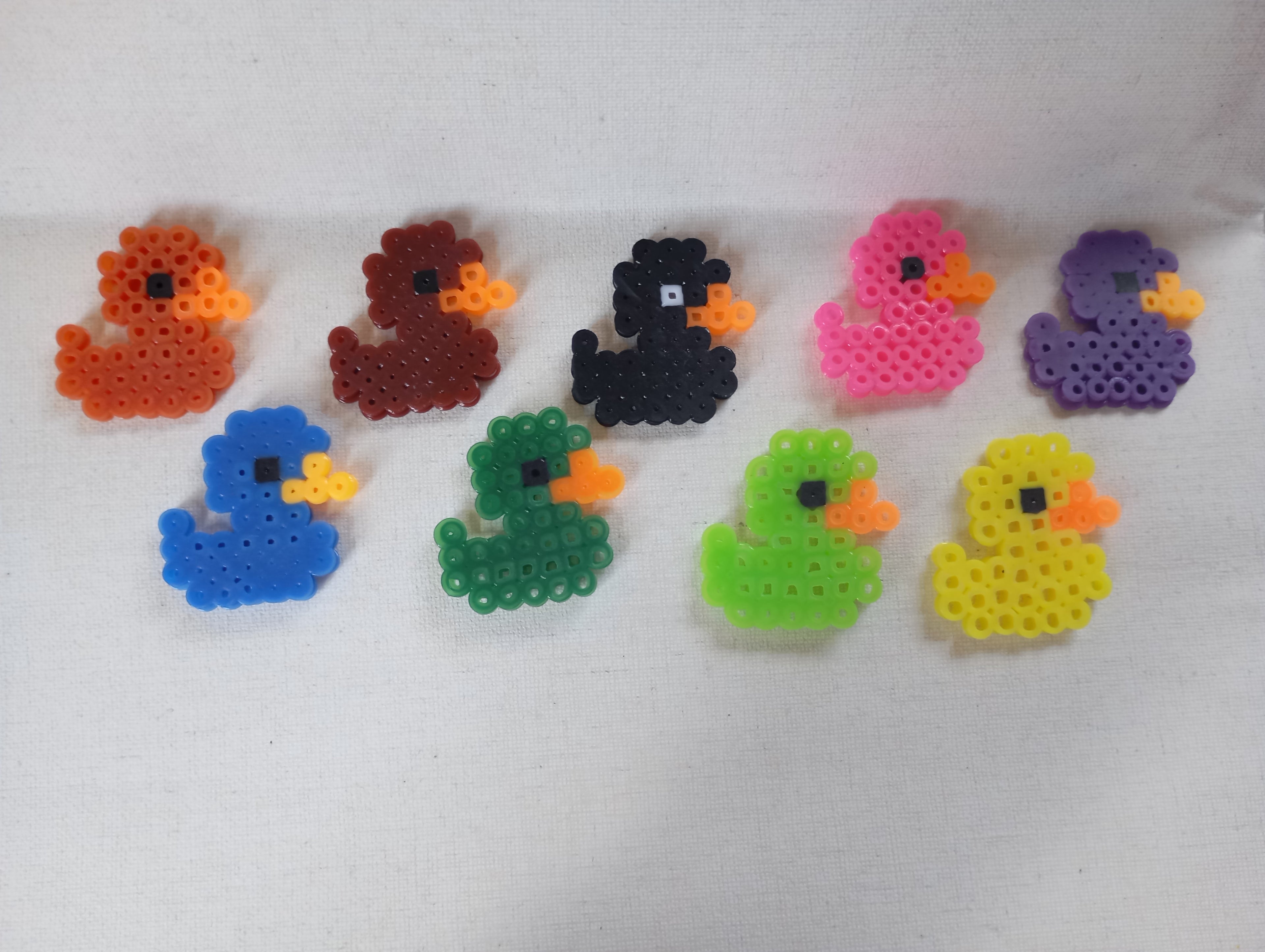 Llaveros de patitos de goma